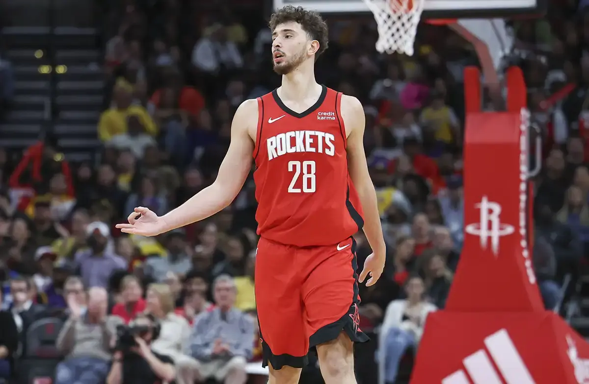 Houston Rockets center Alperen Sengun (28) reacts after scoring a basket during the second quarter against the Los Angeles Lakers at Toyota Center