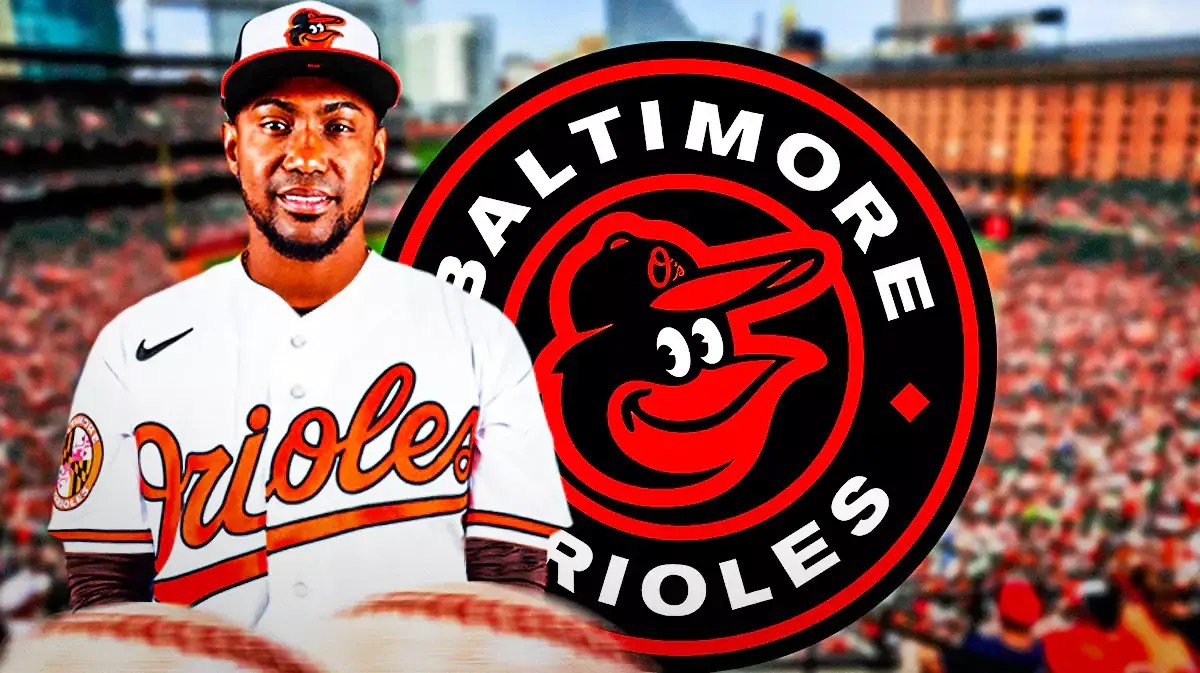 Julio Teheran wearing an Orioles jersey next to an Orioles logo at Camden Yards