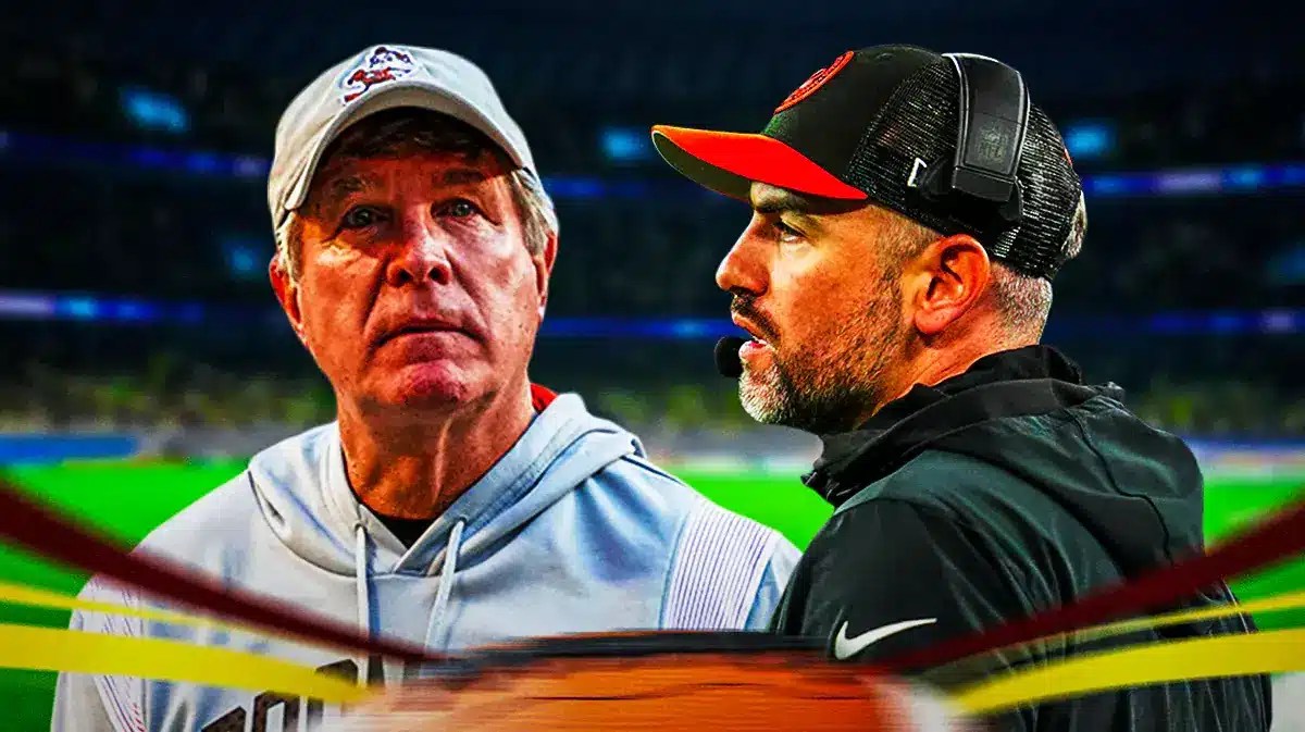 Tennessee Titans head coach Brian and Bill Callahan in front of Nissan Stadium.