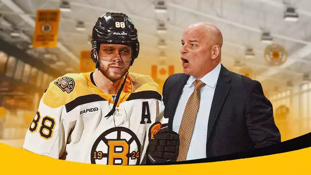 David Pastrnak with Bruins head coach Jim Montgomery.