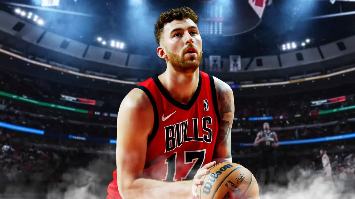 Onuralp Bitim in a Bulls jersey with the Bulls arena in the background