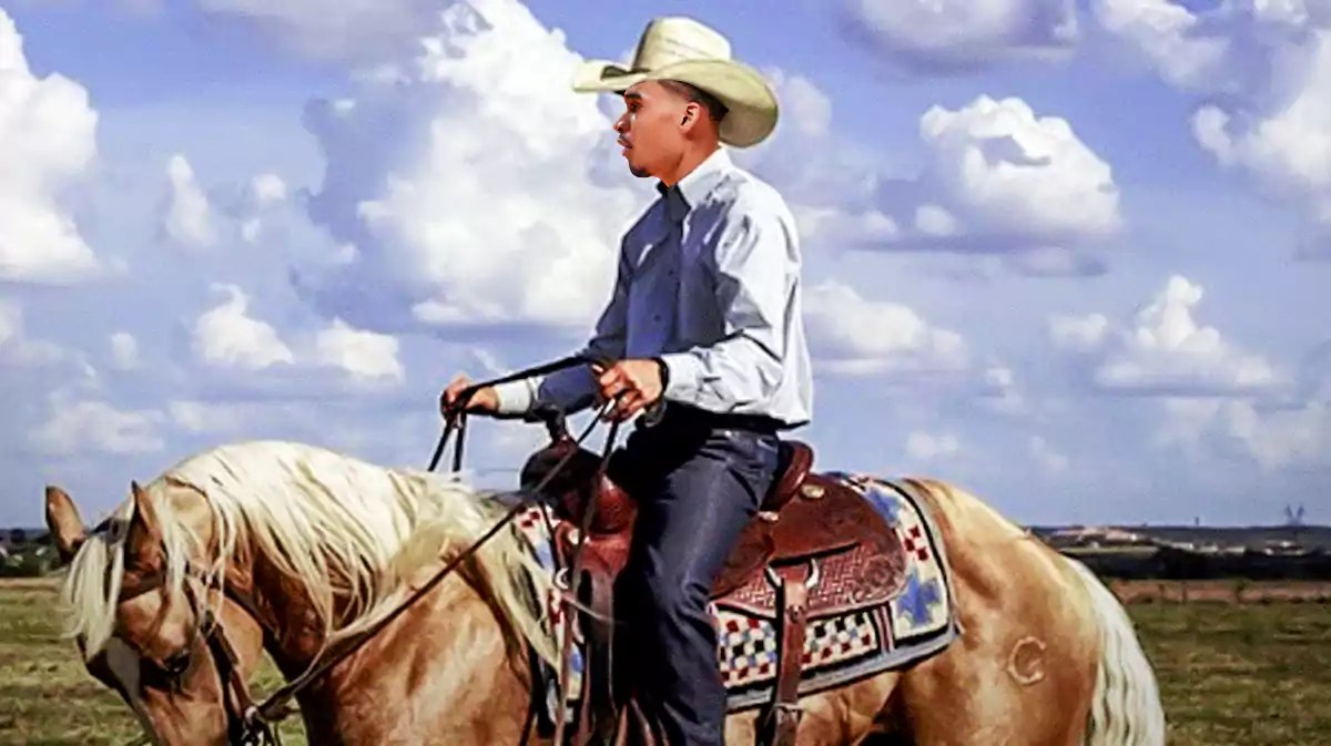 Spurs' Victor Wembanyama in a cowboy outfit riding a horse