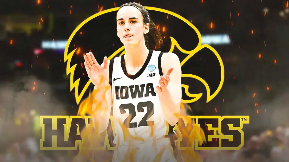 Caitlin Clark stands in front of Iowa women's basketball logo after stats-filled Michigan win