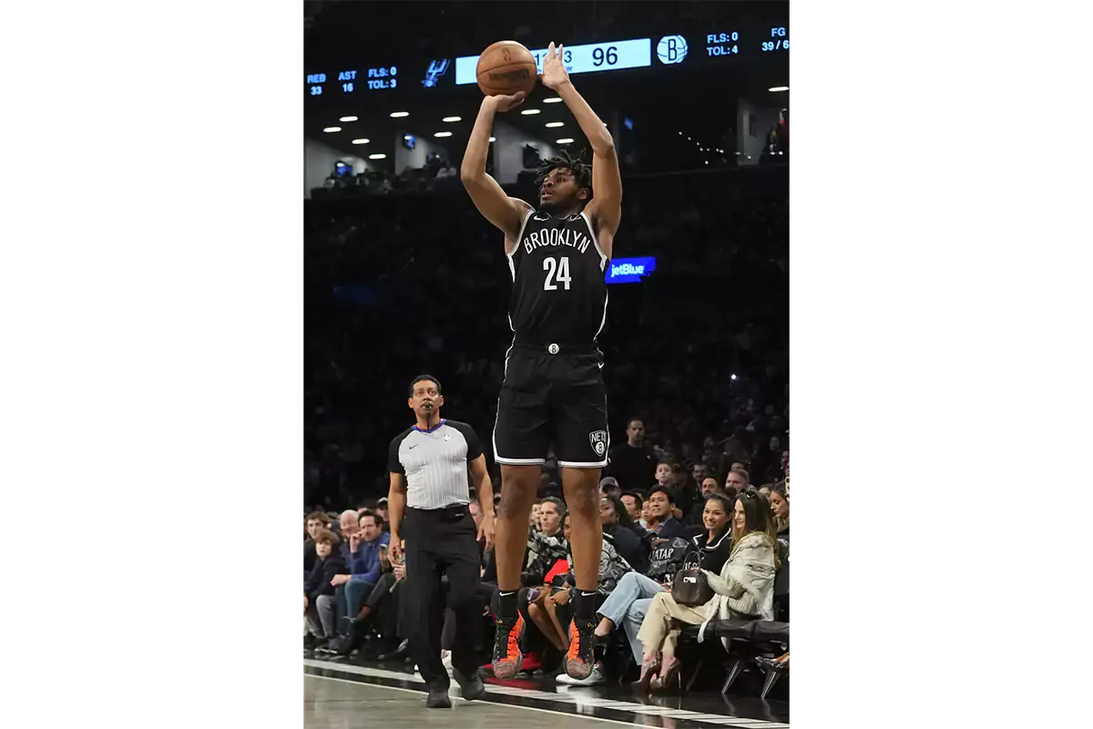 Brooklyn Nets shooting guard Cam Thomas (24) shoots a three point jump shot against the San Antonio Spurs during the second half at Barclays Center.