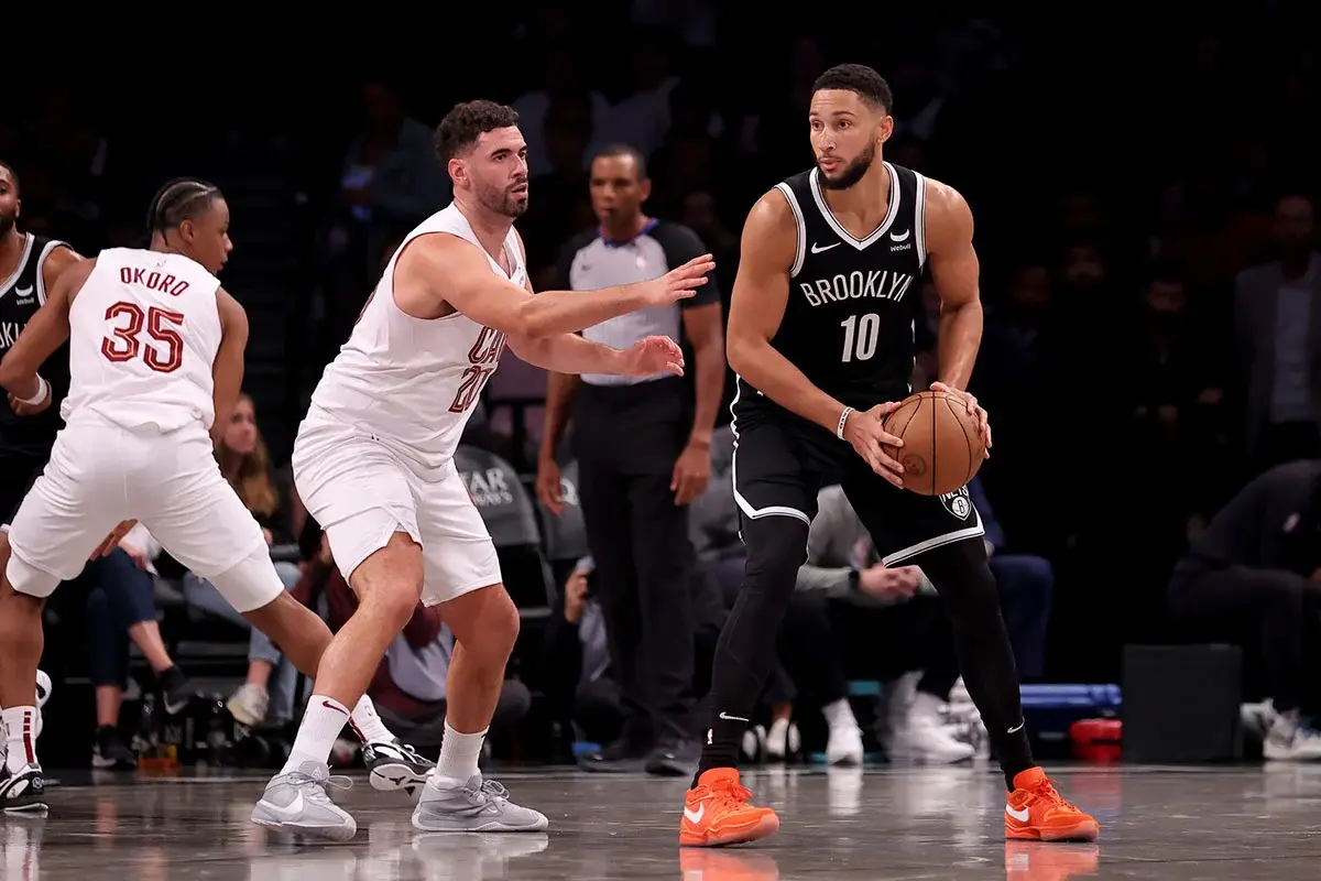 Brooklyn Nets guard Ben Simmons (10) controls the ball against Cleveland Cavaliers forward Georges Niang (20) during the second quarter at Barclays Center