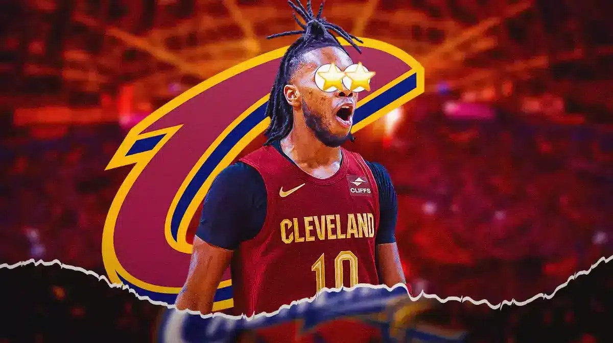 Darius Garland with stars in his eyes in front of a Cavs logo