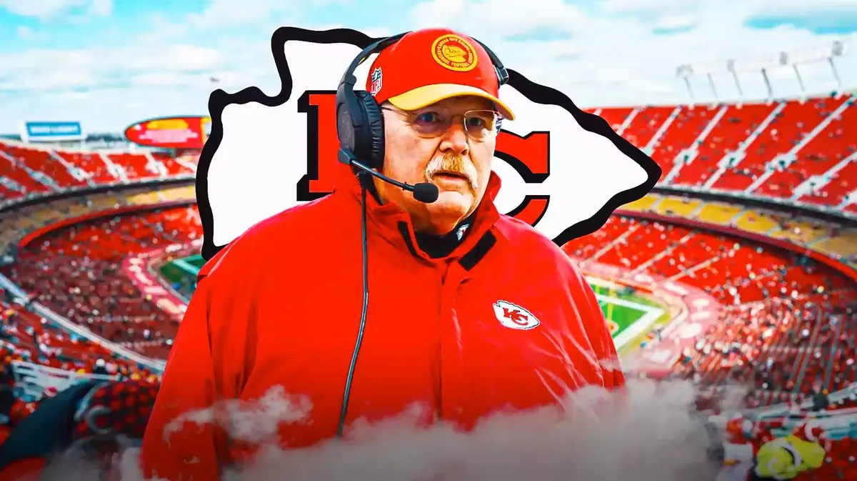 Chiefs' Andy Reid stands next to Kansas logo in front of a Super Bowl/49ers crowd