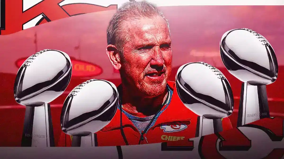Kansas City Chiefs defensive coordinator Steve Spagnuolo surrounded by four Super Bowl trophies.