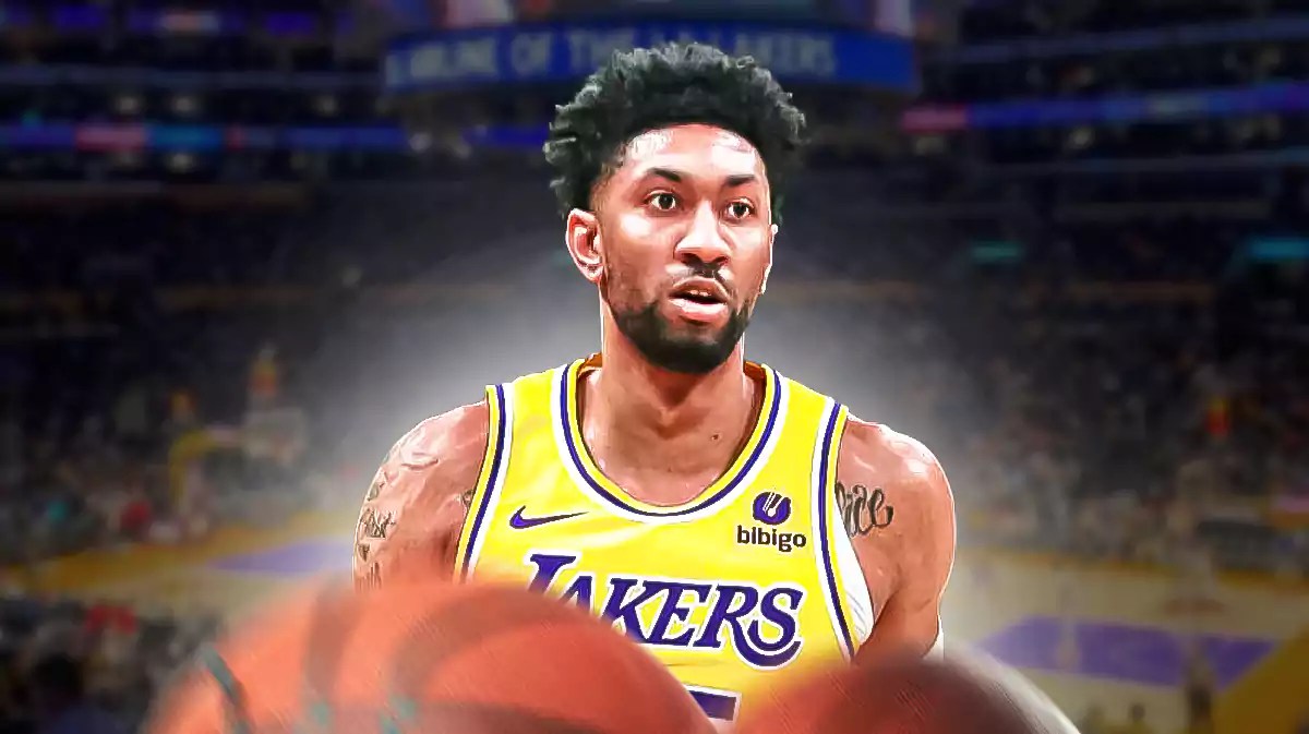 Christian Wood with the Lakers arena in the background, injury