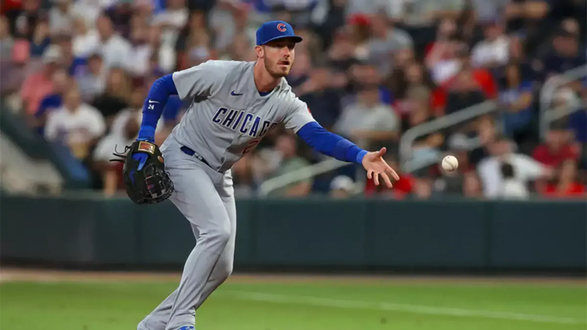 Cody Bellinger flipping a baseball on the Chicago Cubs