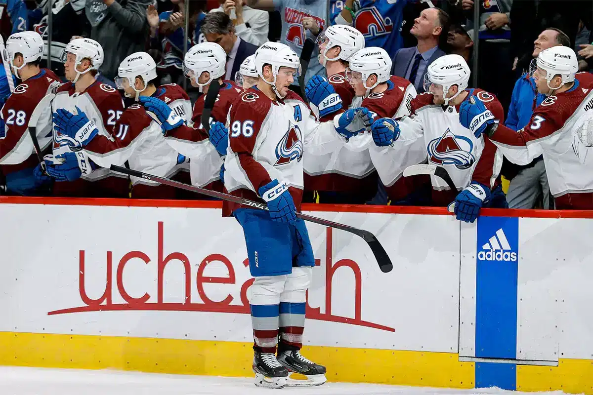 Colorado Avalanche right wing Mikko Rantanen (96) celebrates with the bench after his goal in the third period against the Toronto Maple Leafs at Ball Arena.