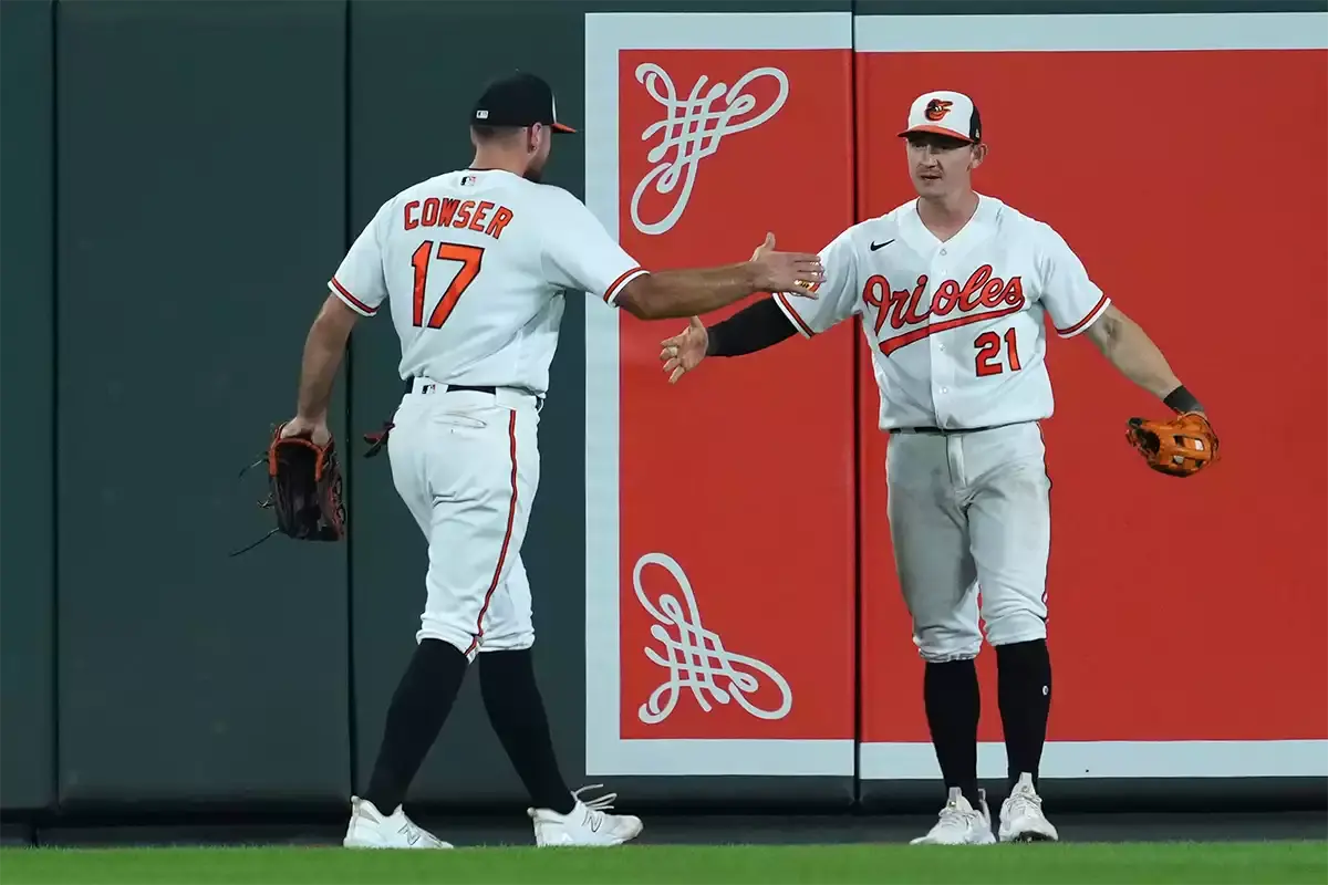 Colton Cowser celebrating on the Baltimore Orioles with Austin Hays, Orioles spring training