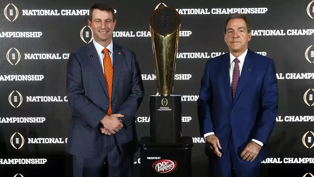 Dabo Swinney and Nick Saban have a joint press conference in Tampa Sunday, January 8, 2017. Swinney and Saban stand beside the championship trophy. Staff Photo/Gary Cosby Jr.