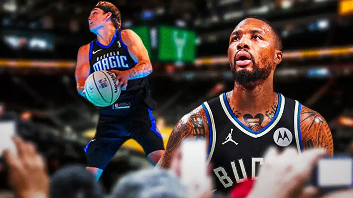 Milwaukee Bucks guard Damian Lillard watching Mac McClung dunk.