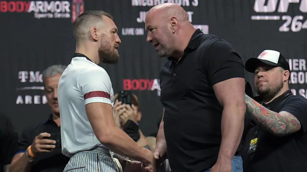  Conor McGregor is greeted by UFC president Dana White during weigh ins for UFC 264 at T-Mobile Arena. Mandatory Credit: Gary A. Vasquez-USA TODAY Sports