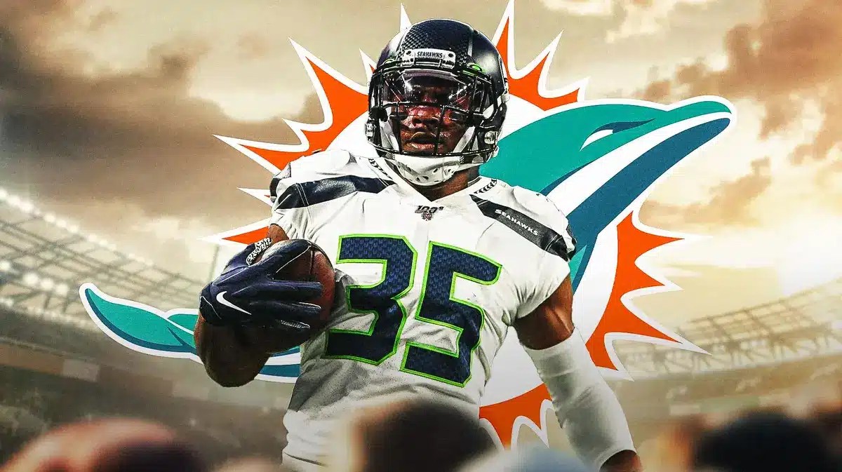Action shot of DeShawn Shead (Seahawks) with Miami Dolphins logo in the background