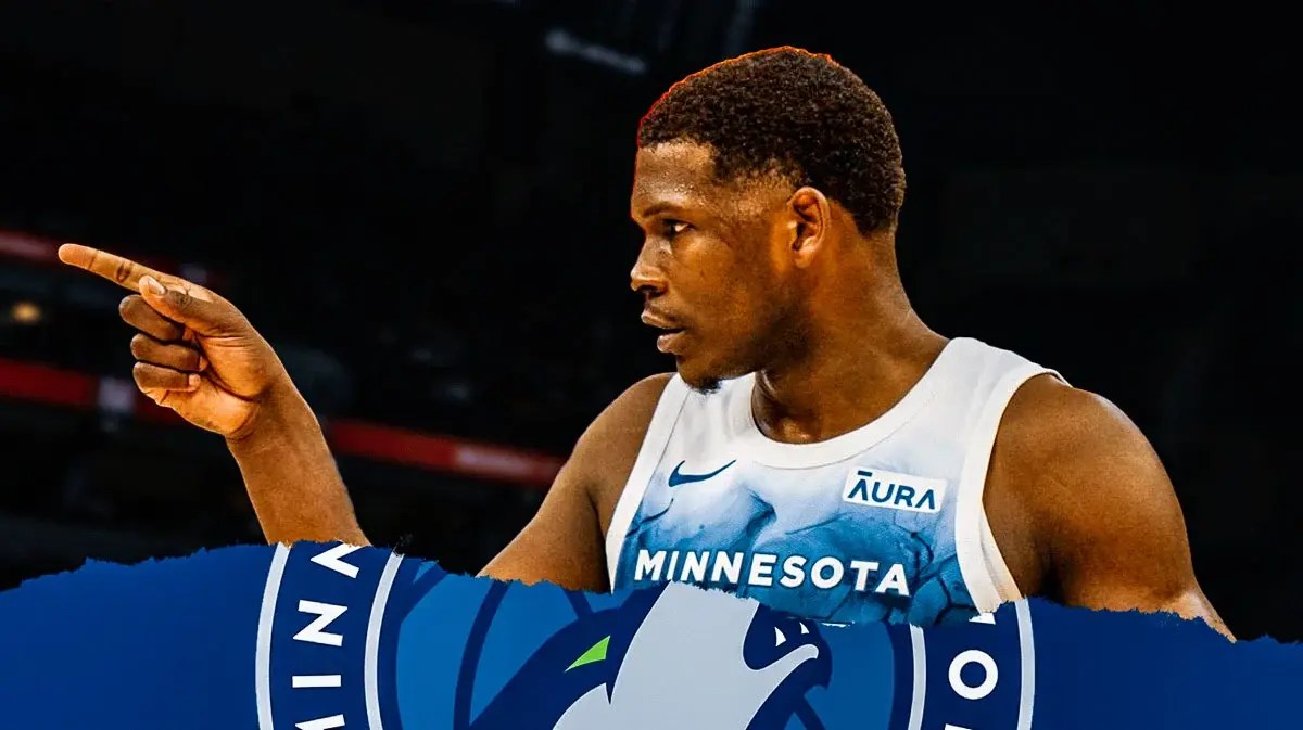 Anthony Edwards with the Timberwolves arena in the background, injury