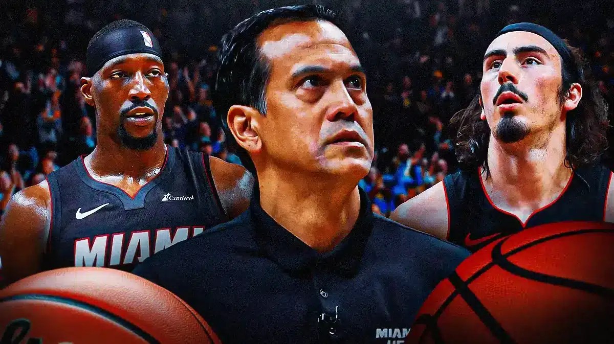 Miami Heat head coach Erik Spoelstra in the middle of Bam Adebayo and Jaime Jaquez Jr. in front of the Kaseya Center.