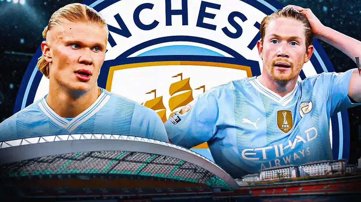 Erling Haaland and Kevin De Bruyne in front of the Manchester City logo