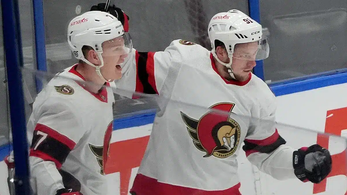 Ottawa Senators right wing Vladimir Tarasenko (91) is congratulated by left wing Brady Tkachuk (7) after scoring a goal against the Tampa Bay Lightning during the third period at Amalie Arena.