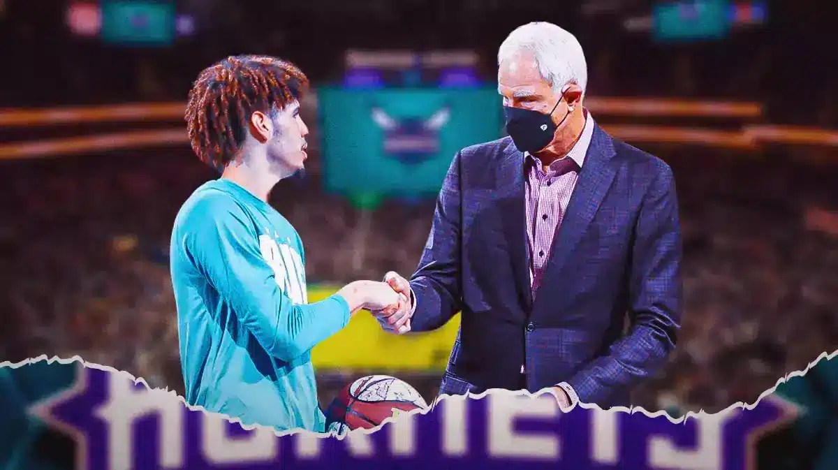 Hornets' LaMelo Ball shaking Mitch Kupchak’s hand