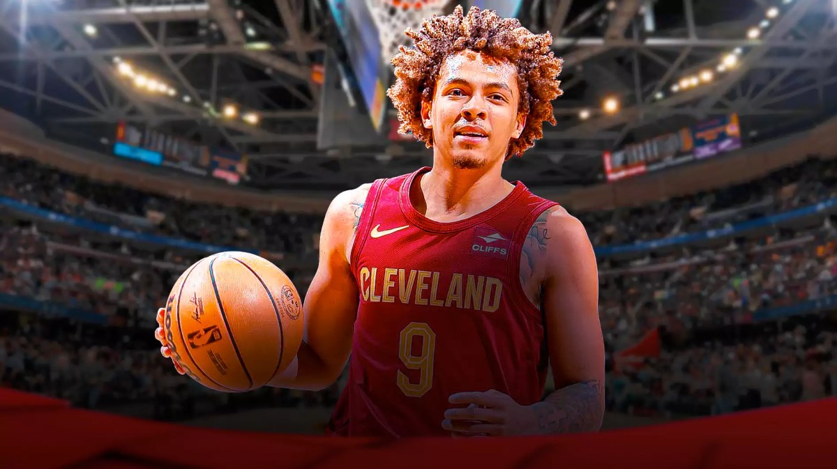Craig Porter Jr. in his Cavs jersey with the Cavs arena in the background, contract