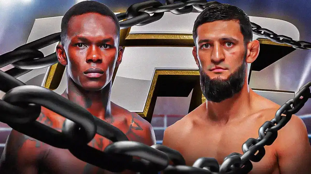 Israel Adesanya facing off Khamzat Chimaev in front of the UFC logo
