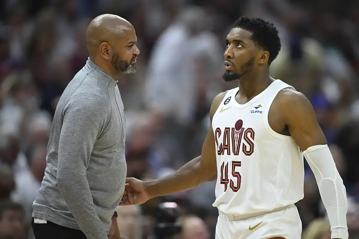 Cleveland Cavaliers head coach J. B. Bickerstaff and guard Donovan Mitchell (45) talk in the third quarter of game one of the 2023 NBA playoffs against the New York Knicks at Rocket Mortgage FieldHouse.