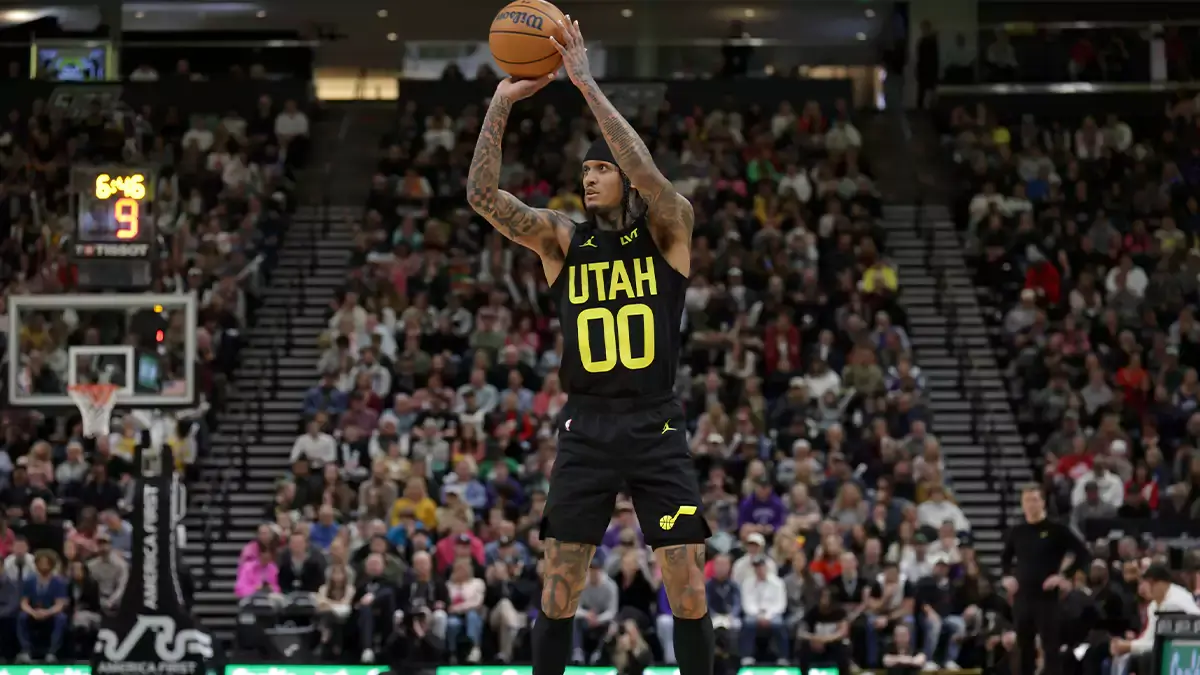 Utah Jazz guard Jordan Clarkson (00) shoots an open jump shot against the Los Angeles Lakers during the second half at Delta Center.
