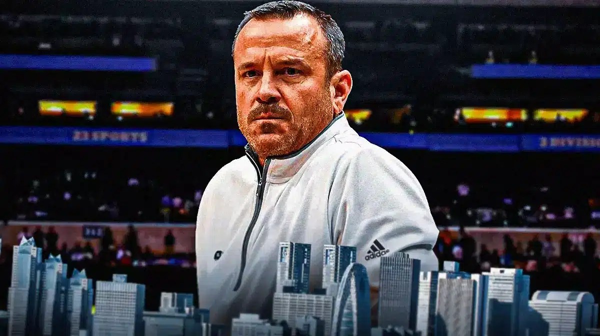 Louisville women’s basketball coach Jeff Walz, with an unhappy expression on his face.