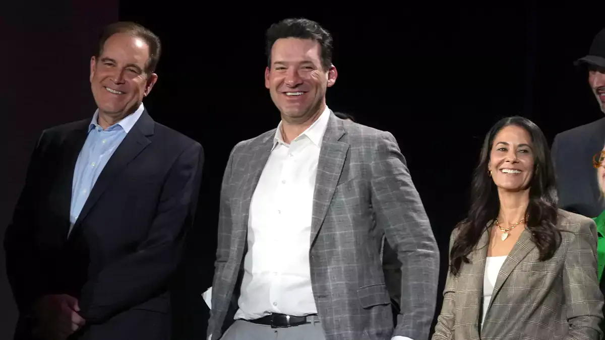 CBS Sports play-by-play announcer Jim Nantz (left), analyst Tony Romo (center) and sideline reporter Tracy Wolfson at press conference at the Super Bowl 58 Media Center at the Mandalay Bay Resort and Casino.