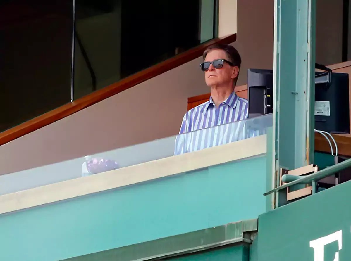 Boston Red Sox owner John Henry watches the game between the Boston Red Sox and the Houston Astros during the fourth inning at Fenway Park.