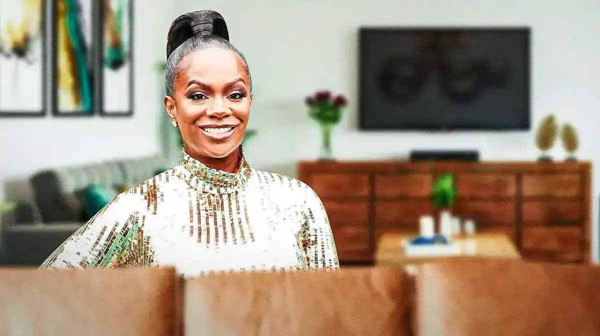 Kandi Burruss with TV behind her