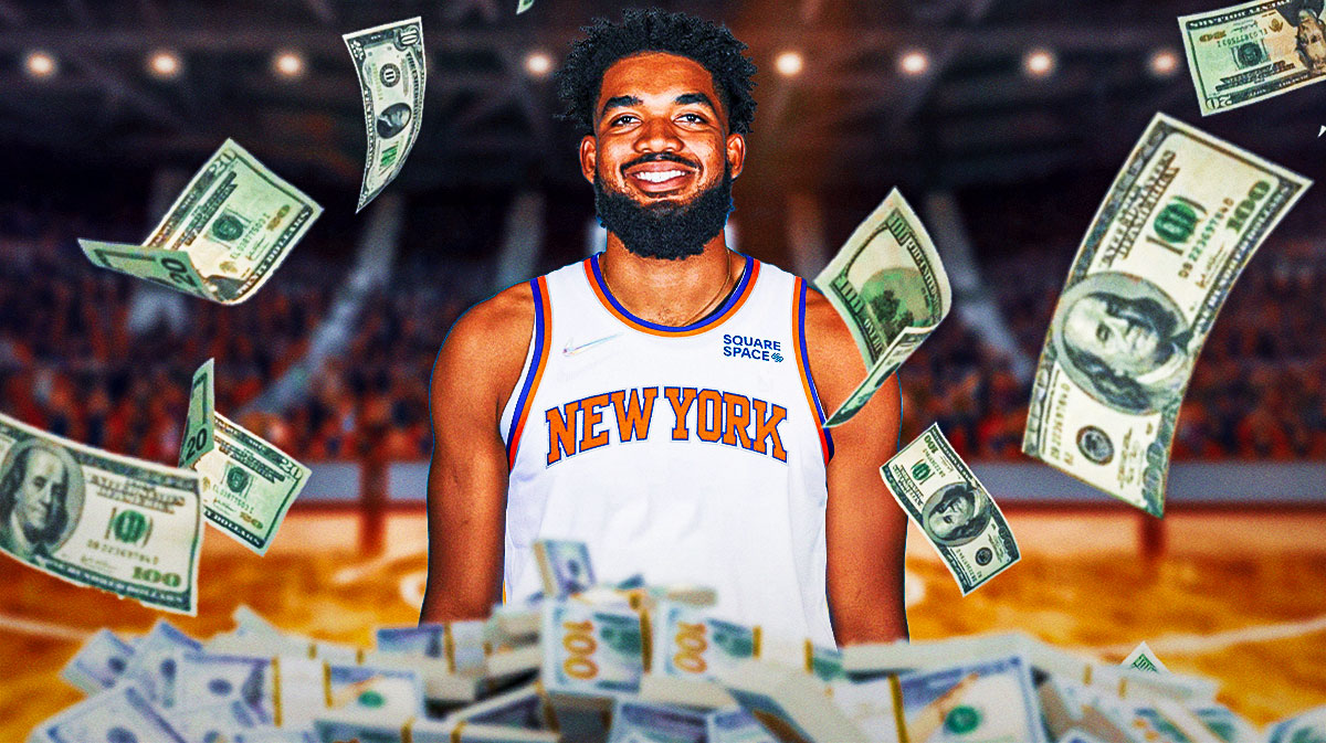 Karl-Anthony Towns surrounded by piles of cash.