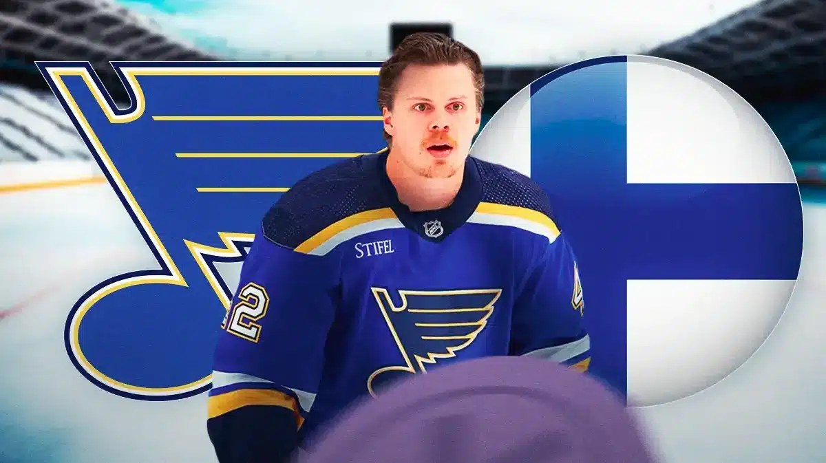 Kasperi Kapanen in middle looking stern, ST. Louis Blues logo, Finnish flag, hockey rink in background