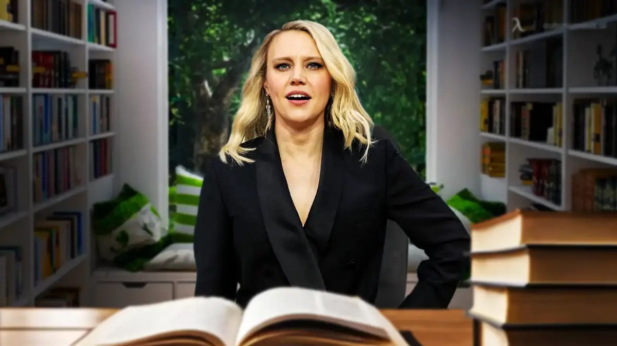 Kate McKinnon with a book.