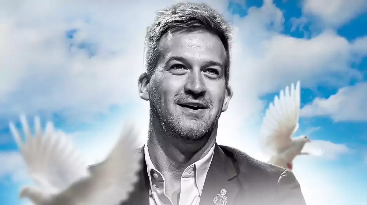 Kenneth Mitchell with doves and clouds.