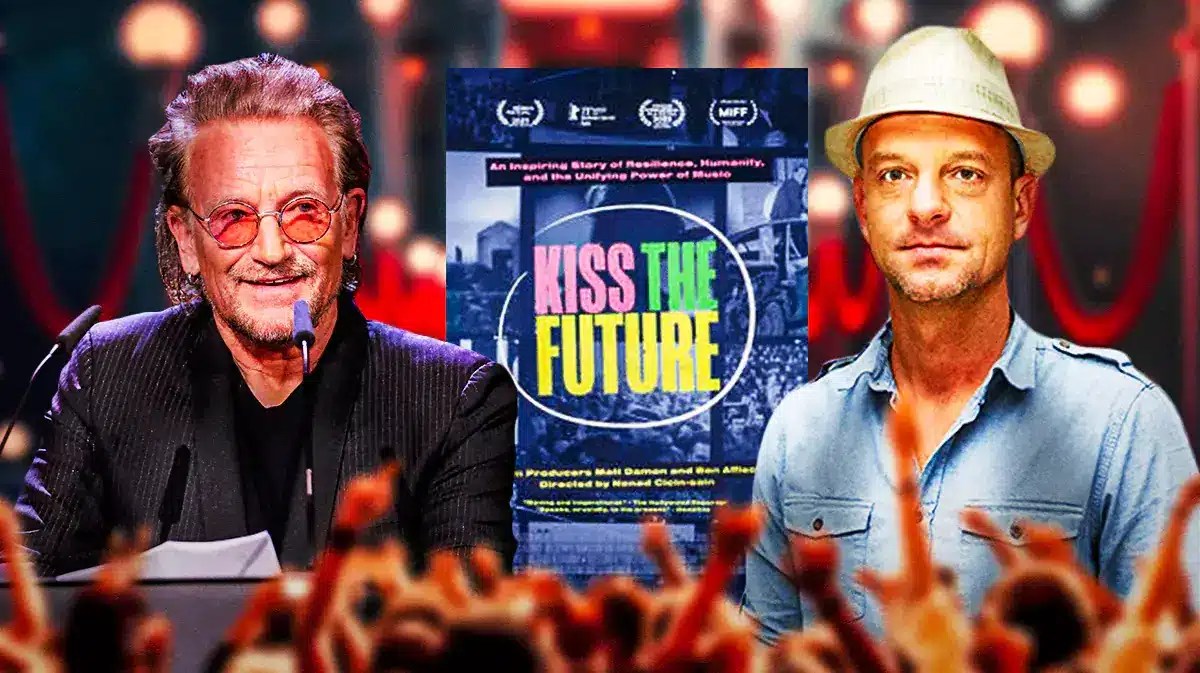 U2 lead singer Bono and Nenad Cicin-Sain with Kiss the Future poster.
