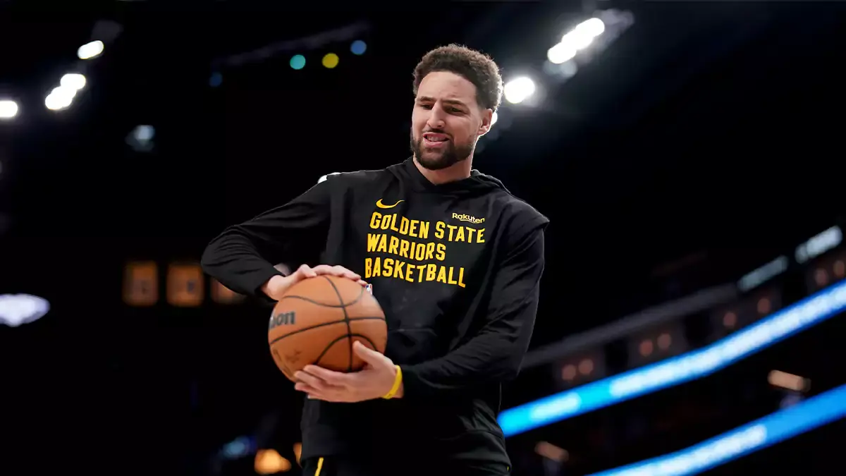Golden State Warriors guard Klay Thompson (11) holds onto the ball before the start of the game against the New Orleans Pelicans at the Chase Center.