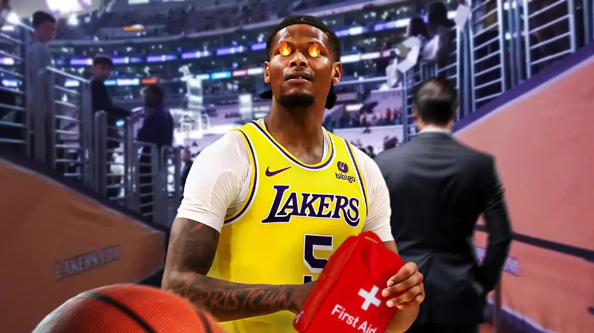 Cam Reddish with fire in his eyes while holding a first-aid kit