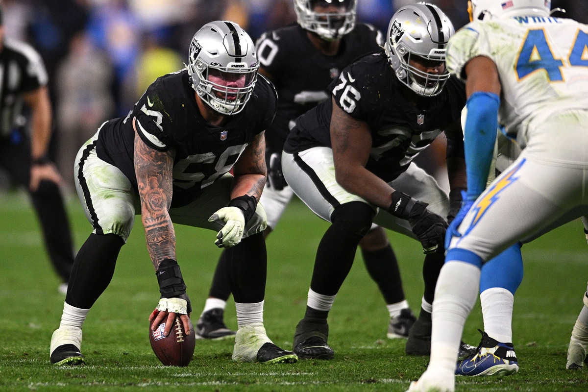 Las Vegas Raiders center Andre James (68) awaits the snap during overtime against the Los Angeles Chargers at Allegiant Stadium.