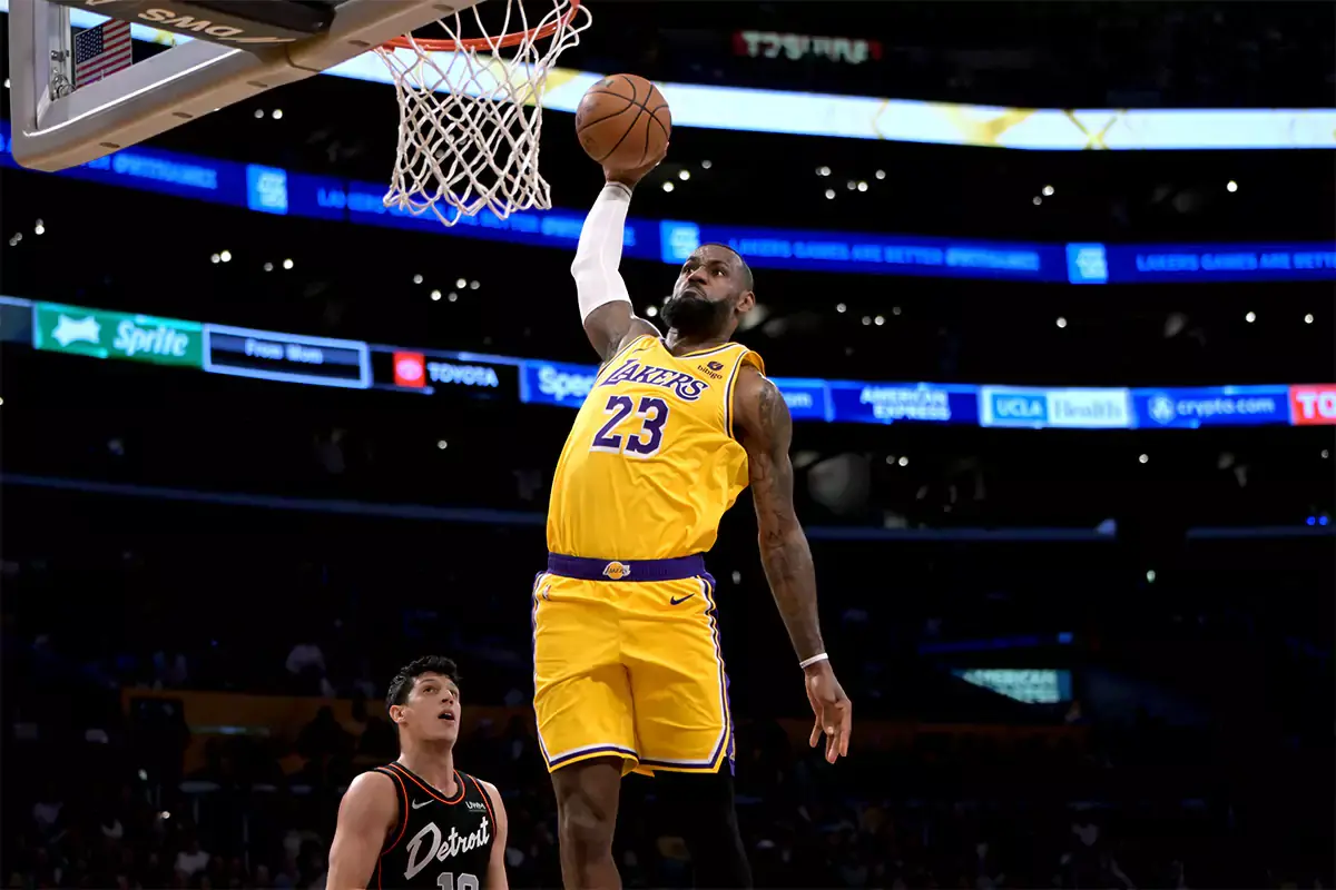 Los Angeles Lakers forward LeBron James (23) goes up for a dunk in the first half against the Detroit Pistons at Crypto.com Arena. Slam Dunk Contest