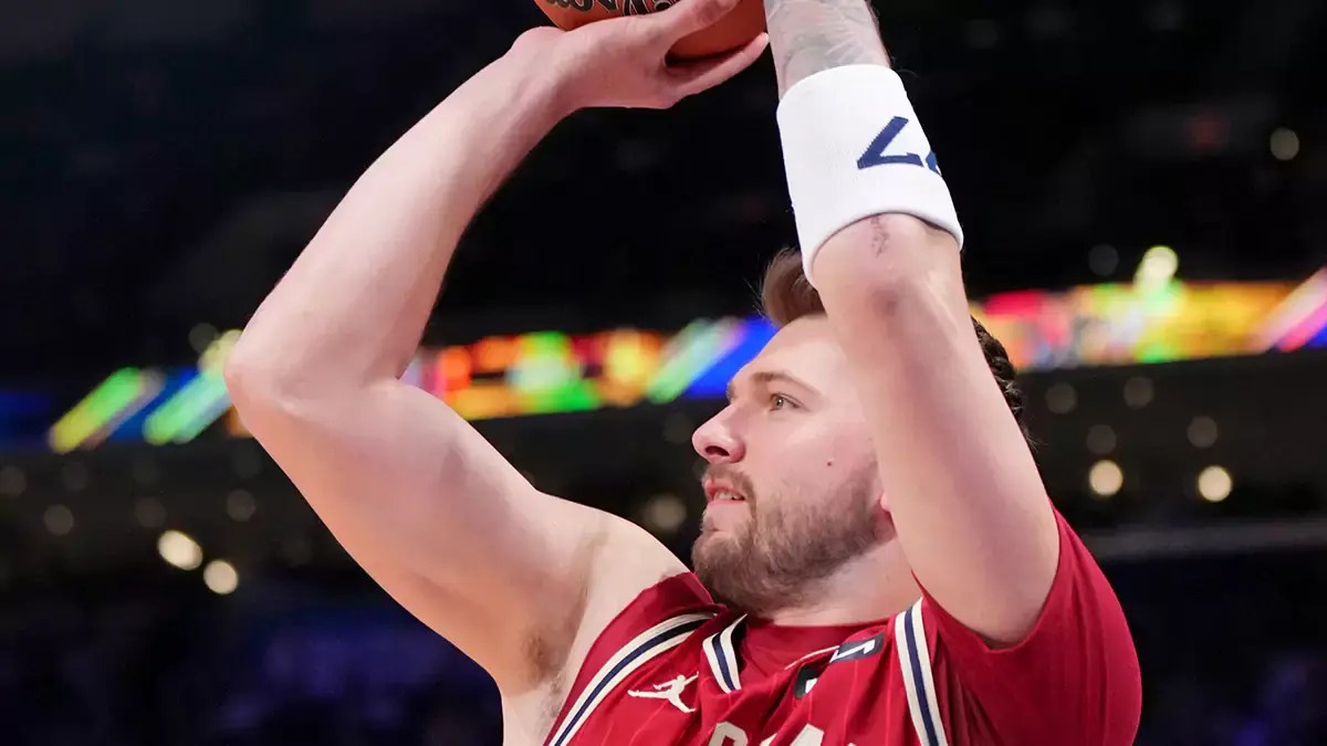 Dallas Mavericks Western Conference forward Luka Doncic, 77, shoots the ball during the first half of the 73rd NBA All-Star Game at Gainbridge Fieldhouse.