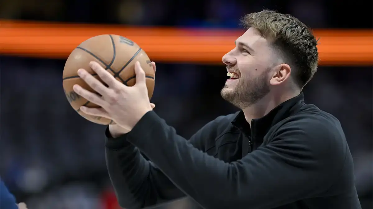 Dallas Mavericks guard Luka Doncic (77) warms up before the game between the Dallas Mavericks and the Washington Wizards at the American Airlines Center