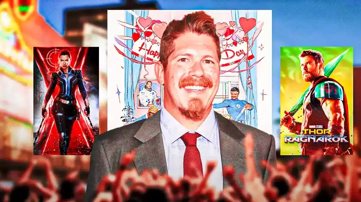 MCU writer Eric Pearson with posters of Fantastic Four, Thor: Ragnarok, and Black Widow.