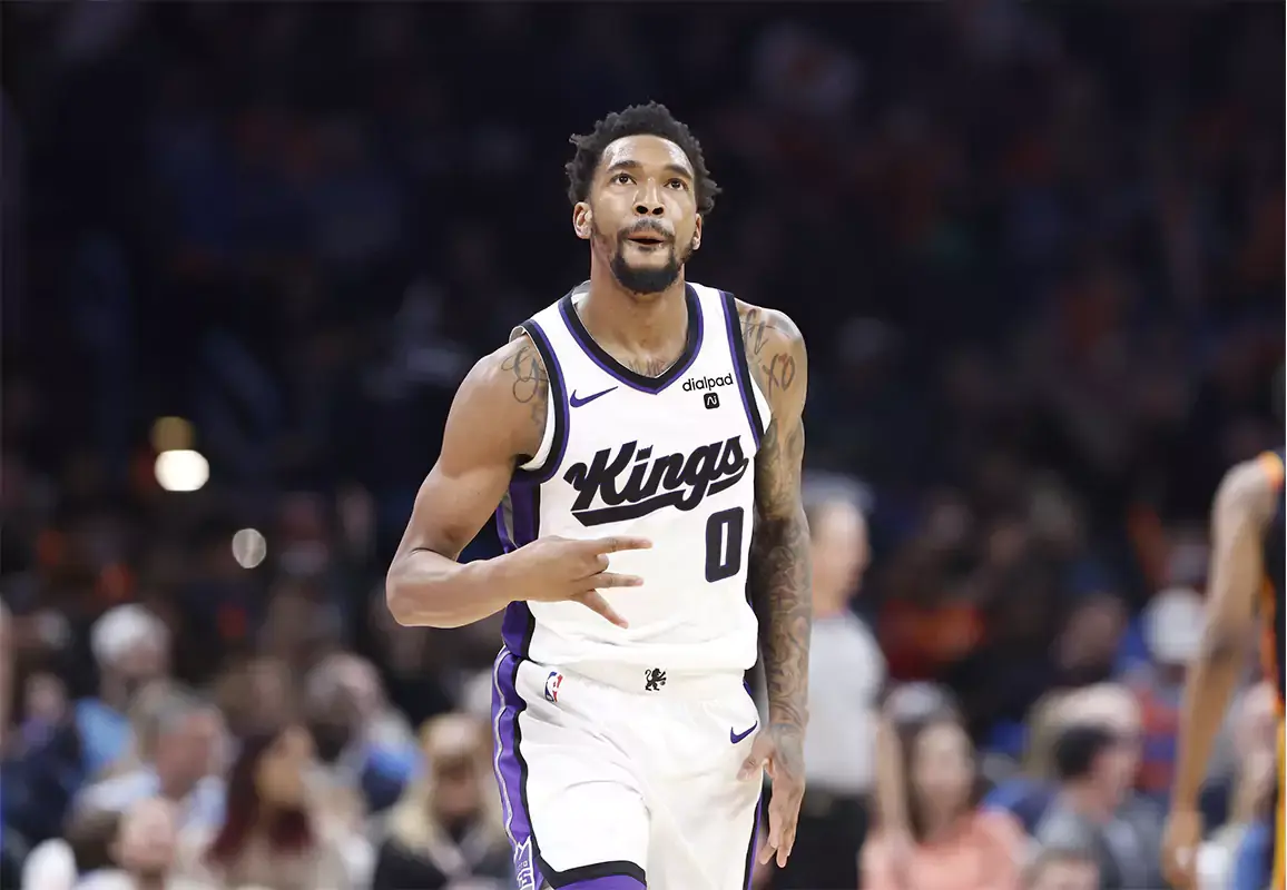 Sacramento Kings guard Malik Monk (0) gestures after scoring a three point basket against the Oklahoma City Thunder during the second half at Paycom Center.