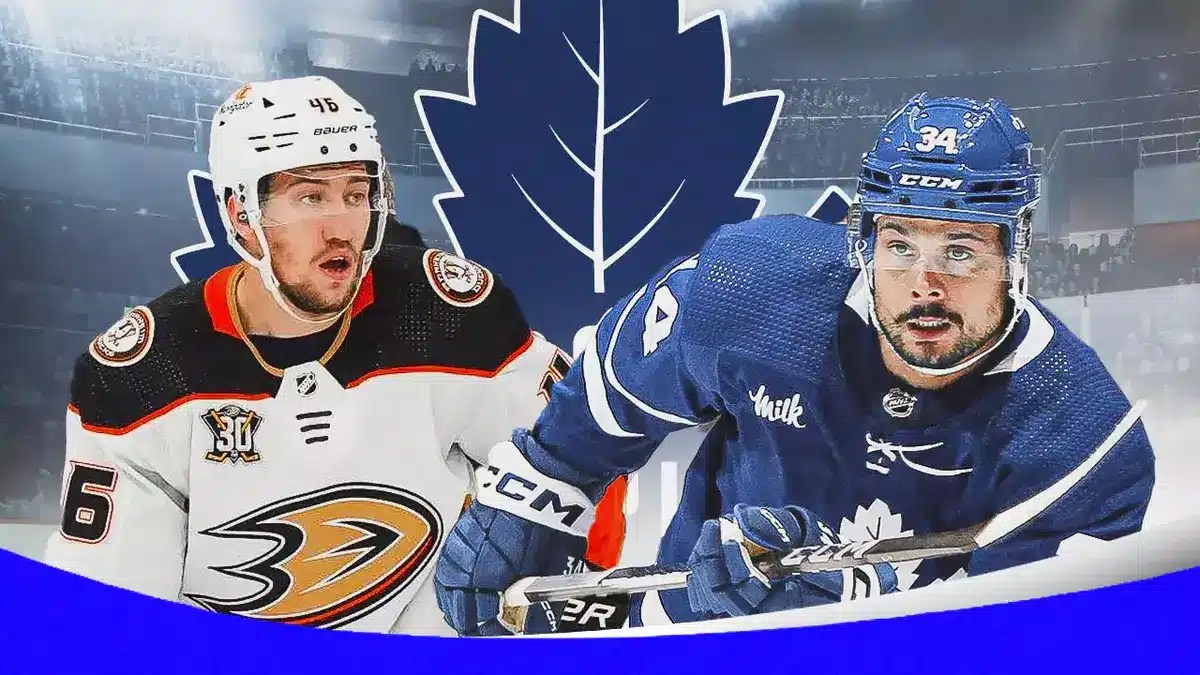 Ducks' Ilyan Lyubushkin stands next to Maple Leafs' Auston Matthews after NHL trade