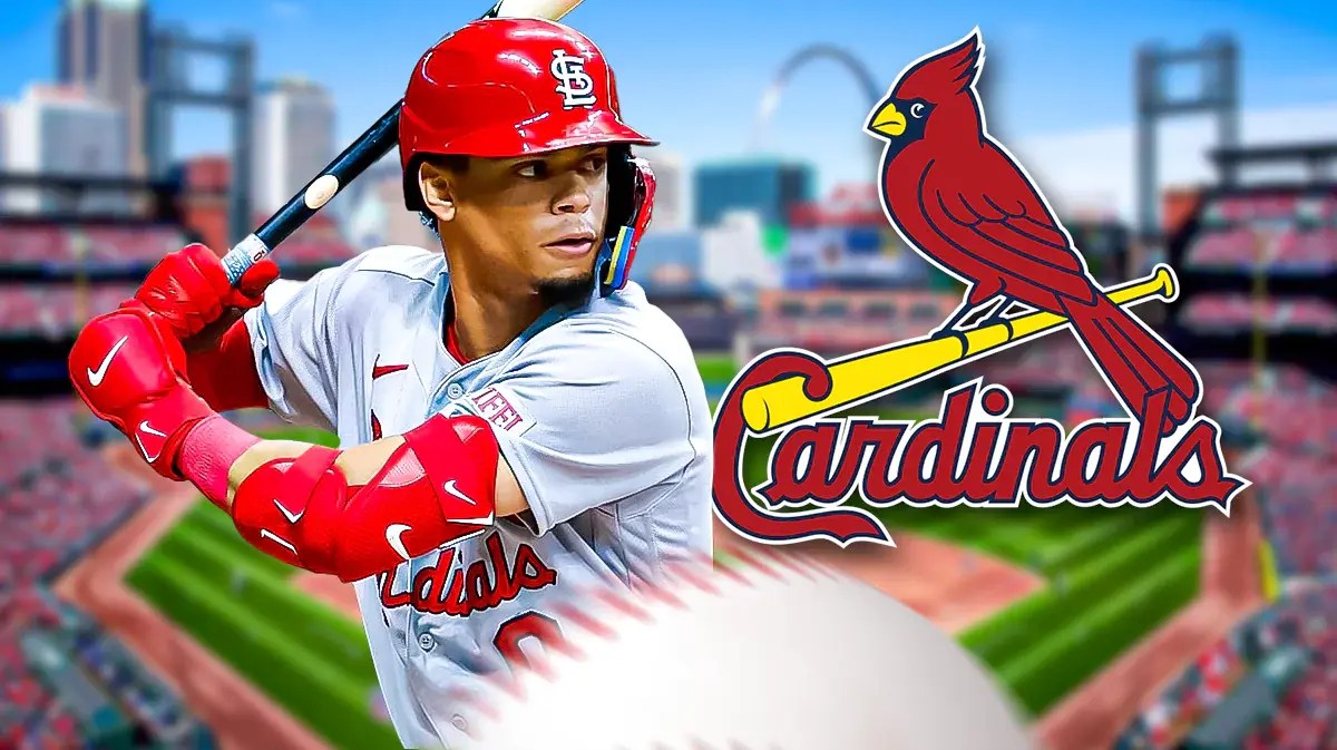 Masyn Winn swinging a bat next to a Cardinals logo. Background is Busch Stadium