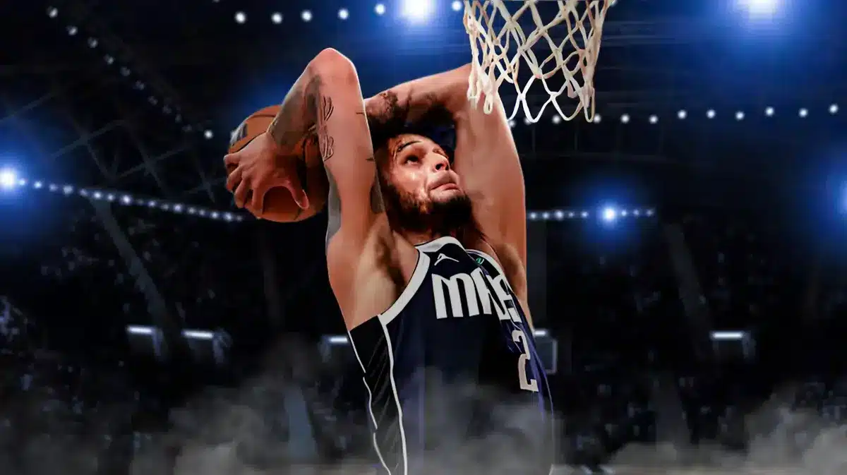 Mavericks' Dereck Lively dunking a basketball.
