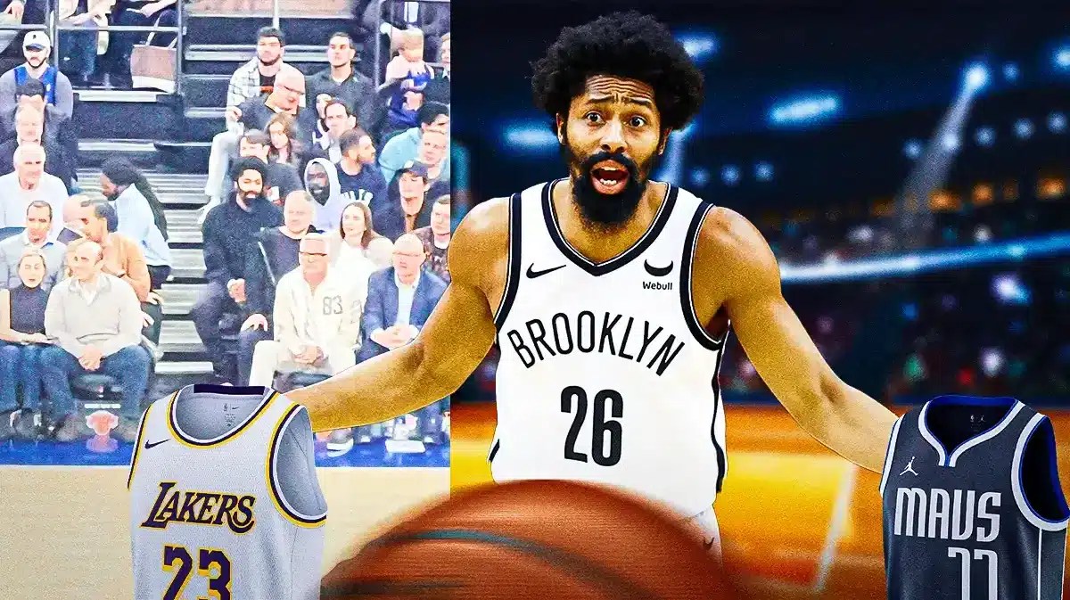 Spencer Dinwiddie holding a Mavs, Lakers jersey